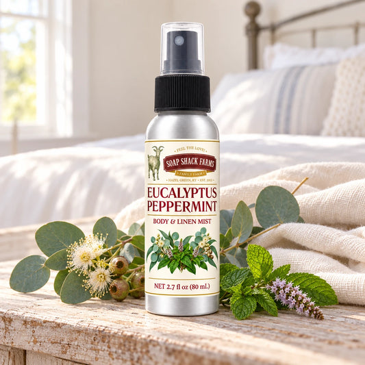 Soap Shack Farms Eucalyptus Peppermint body and linen mist on a farmhouse bedside table with natural botanicals and linen.