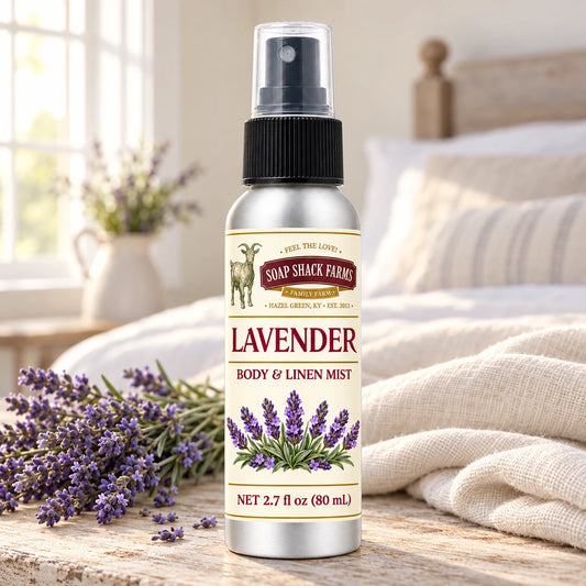 Soap Shack Farms Lavender body and linen mist on a farmhouse bedside table with natural botanicals and linen.