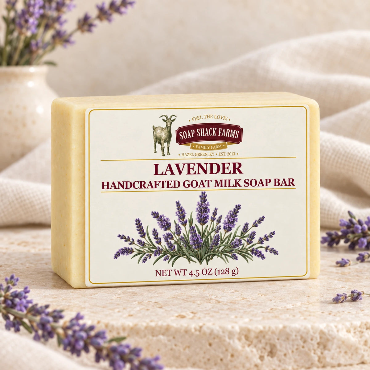 Lavender goat milk soap bar with lavender sprigs and soft cream linen.