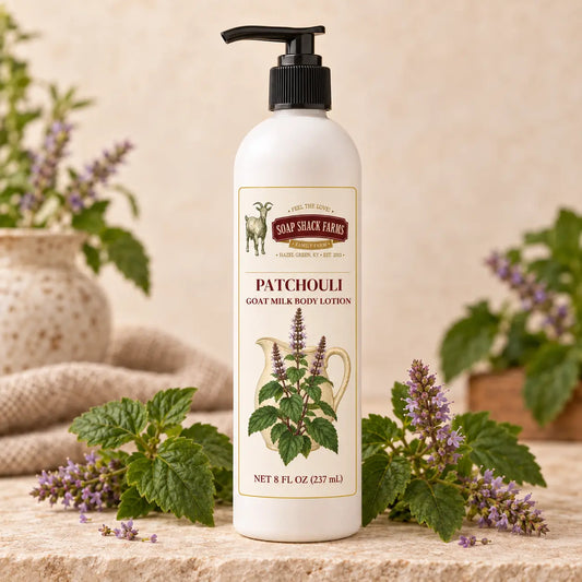 Patchouli Goat Milk Body Lotion with patchouli leaves and purple flowers