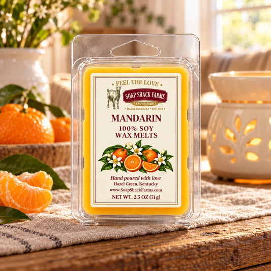 Soap Shack Farms Mandarin 100% Soy Wax Melts on a rustic farmhouse table with linen and a softly blurred wax warmer.