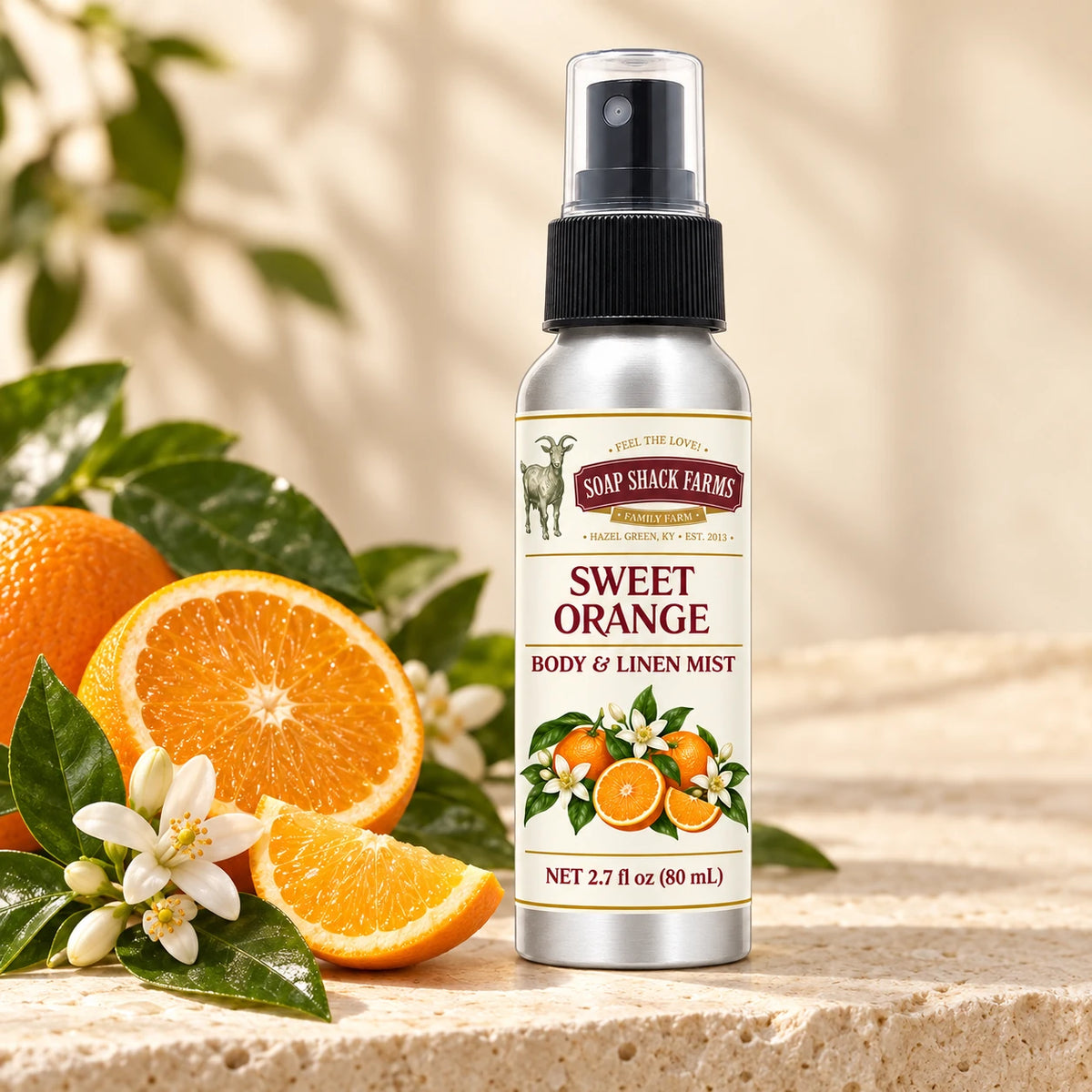 Soap Shack Farms Sweet Orange body and linen mist in a warm botanical studio setting.