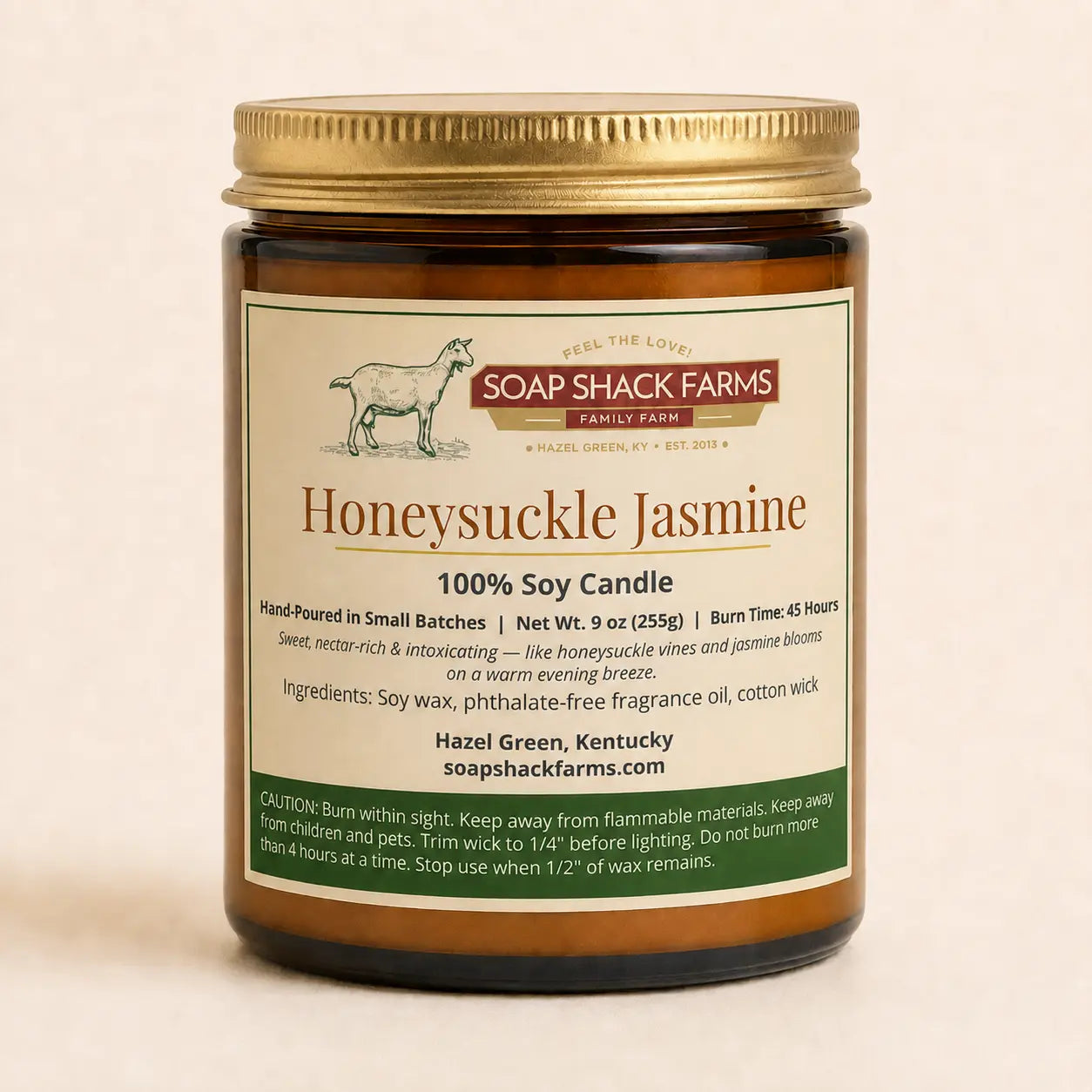 Honeysuckle Jasmine Soy Candle by Soap Shack Farms in amber glass jar with gold lid