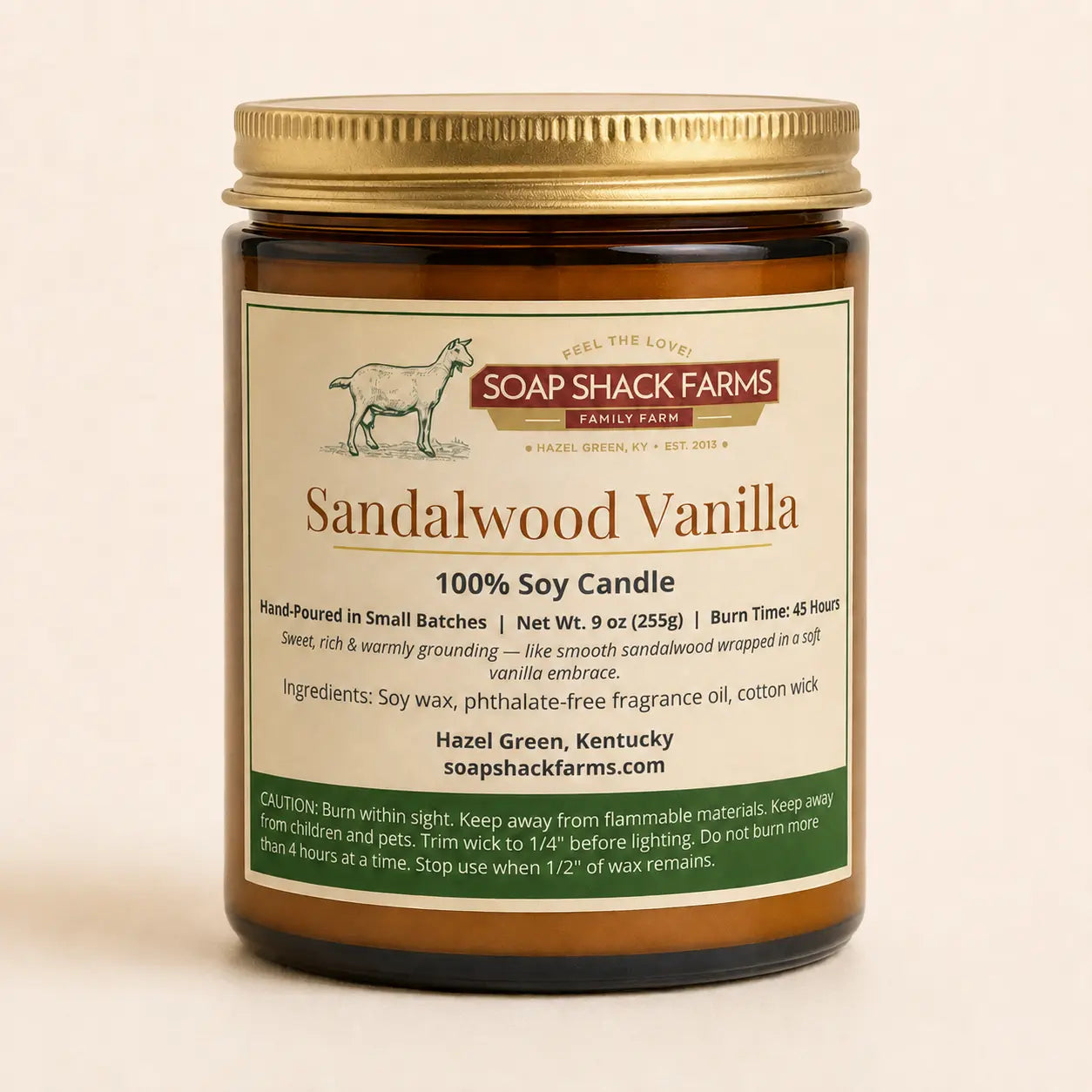 Sandalwood Vanilla Soy Candle by Soap Shack Farms in amber glass jar with gold lid