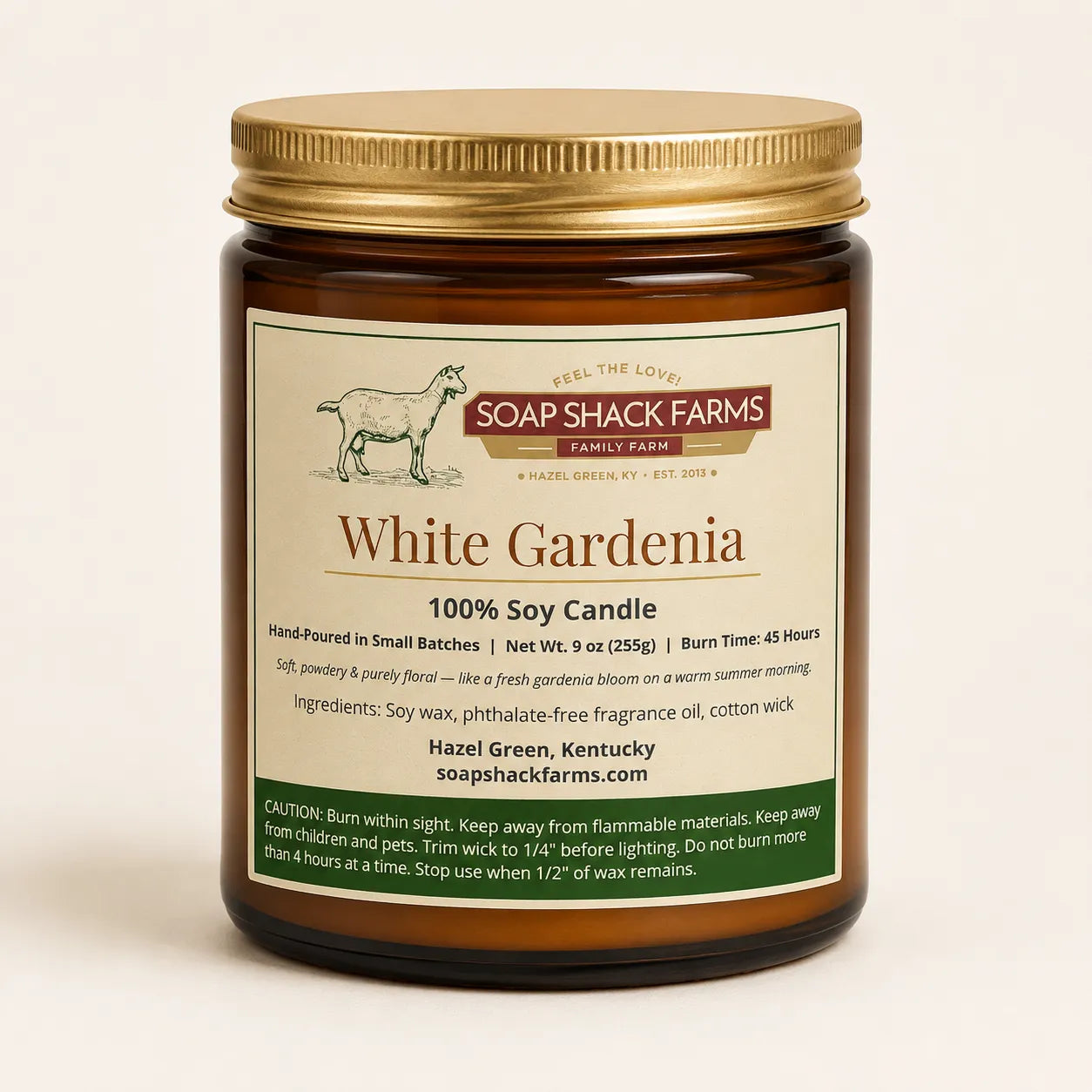 White Gardenia Soy Candle by Soap Shack Farms in amber glass jar with gold lid