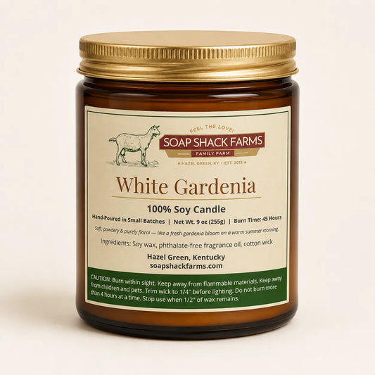 White Gardenia Soy Candle by Soap Shack Farms in amber glass jar with gold lid