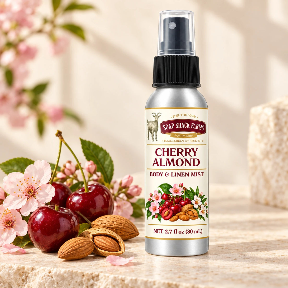 Soap Shack Farms Cherry Almond body and linen mist in a warm botanical studio setting.