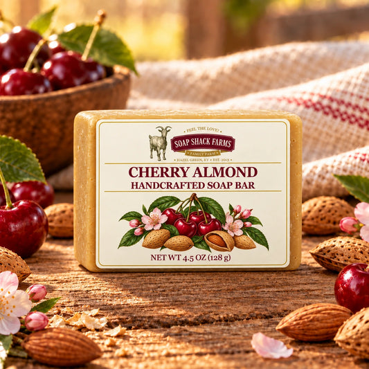 Cherry Almond handcrafted soap bar on rustic wood with cherries, almonds, blossoms, and farmhouse linen.