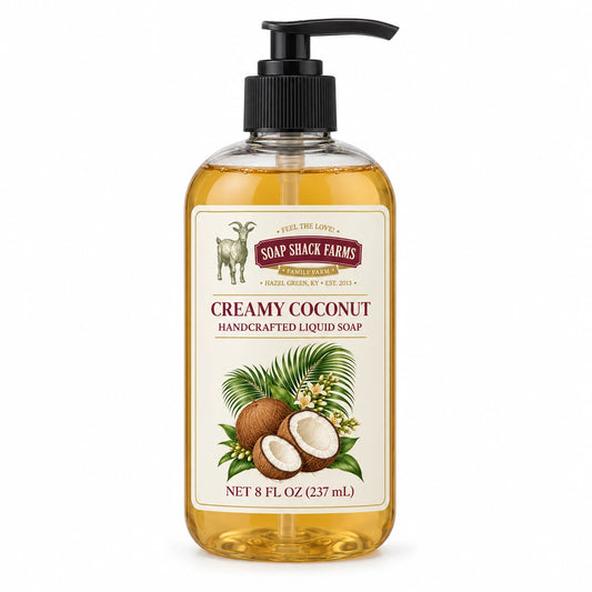 Creamy Coconut handcrafted liquid soap in a clear 8 oz pump bottle on a white background.