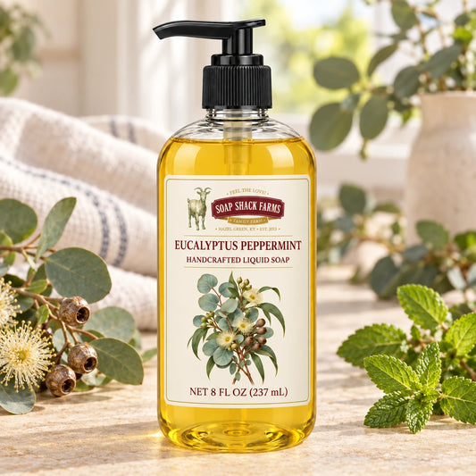 Eucalyptus Peppermint handcrafted liquid soap with eucalyptus branches, peppermint sprigs, seed pods, and farmhouse linen.
