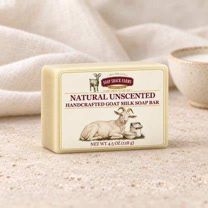 Natural Unscented goat milk soap bar with soft cream linen and a stoneware bowl of milk.