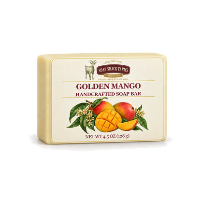 Golden Mango handcrafted olive oil soap bar with mango botanical label on a white background.