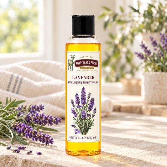 Lavender luxurious body wash with fresh lavender stems, purple flower spikes, and farmhouse linen in a sunlit setting.