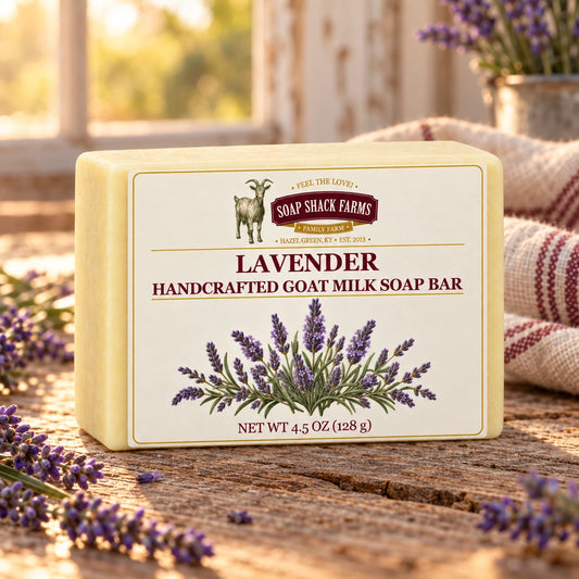 Lavender goat milk soap bar on rustic wood with lavender and farmhouse linen.