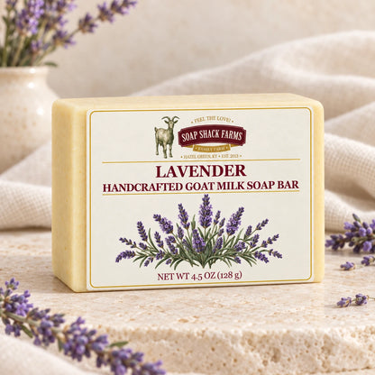 Lavender goat milk soap bar with lavender sprigs and soft cream linen.