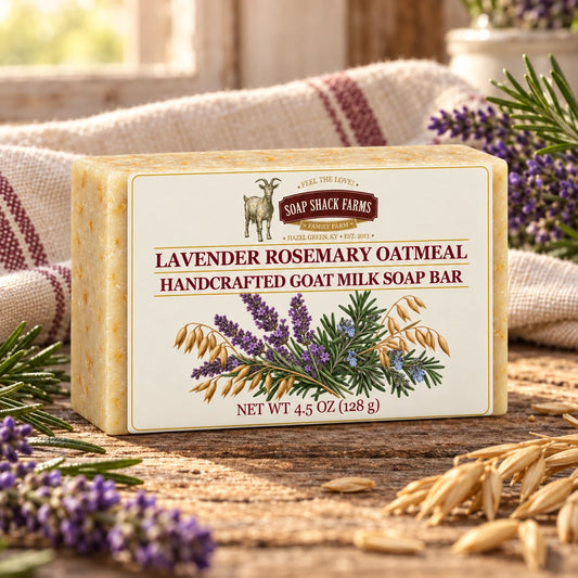 Lavender Rosemary Oatmeal goat milk soap bar on rustic wood with lavender, rosemary, oats, and farmhouse linen.