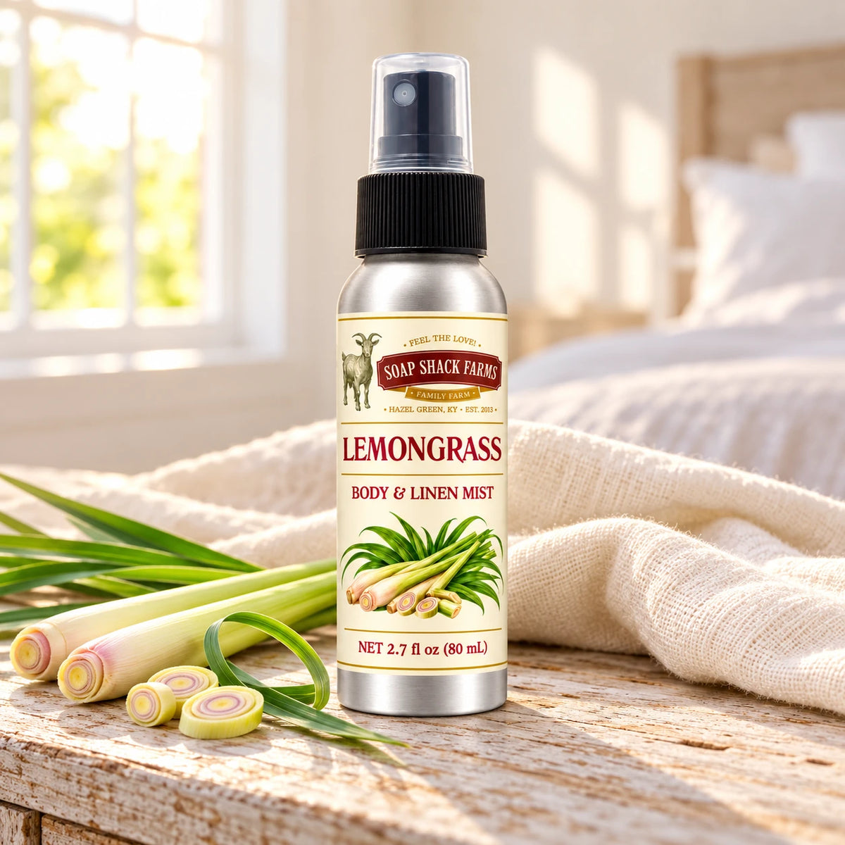 Soap Shack Farms Lemongrass body and linen mist on a farmhouse bedside table with natural botanicals and linen.