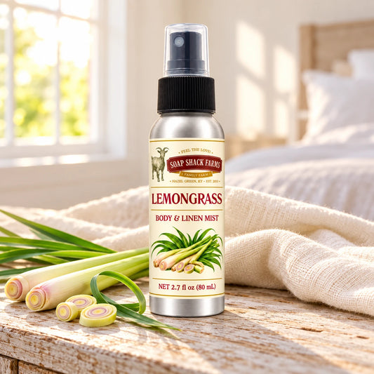 Soap Shack Farms Lemongrass body and linen mist on a farmhouse bedside table with natural botanicals and linen.