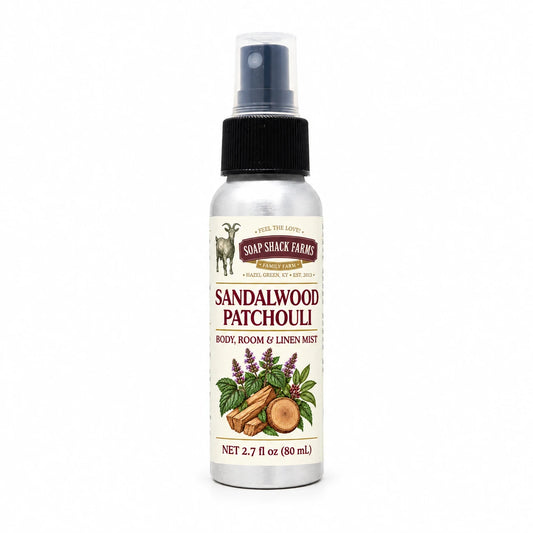 Soap Shack Farms Sandalwood Patchouli body, room and linen mist in a silver 80 mL fine-mist bottle on white.