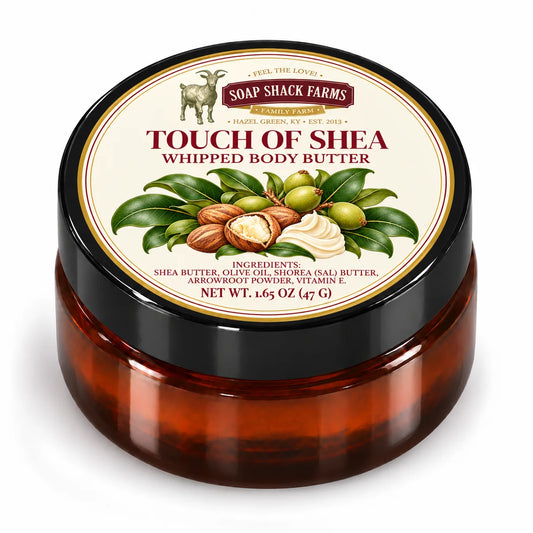 Soap Shack Farms Touch of Shea Whipped Body Butter in a closed amber jar with a labeled black lid on white.