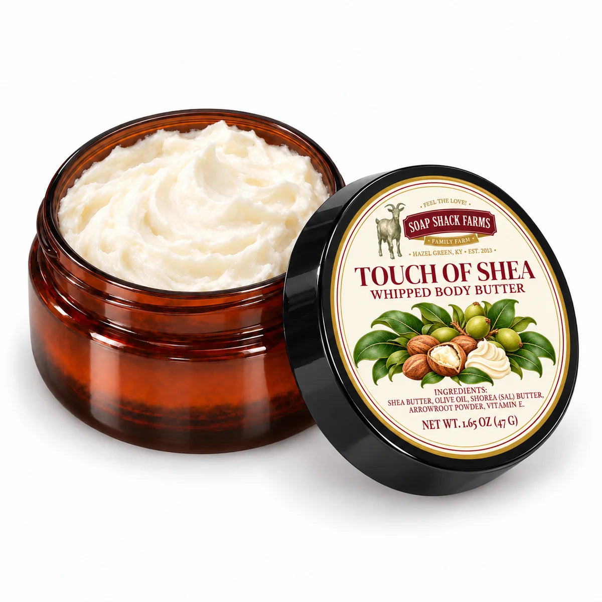 Soap Shack Farms Touch of Shea Whipped Body Butter in an open amber jar showing ivory whipped texture beside its labeled black lid.