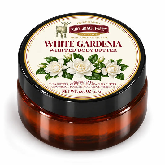 Soap Shack Farms White Gardenia Whipped Body Butter in a closed amber jar with a labeled black lid on white.