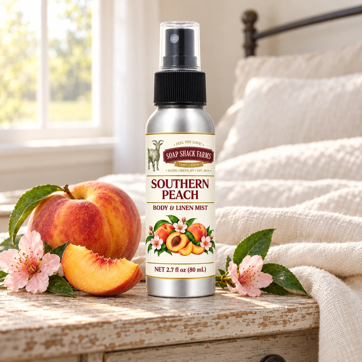 Soap Shack Farms Southern Peach body and linen mist on a farmhouse bedside table with natural botanicals and linen.