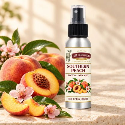 Soap Shack Farms Southern Peach body and linen mist in a warm botanical studio setting.