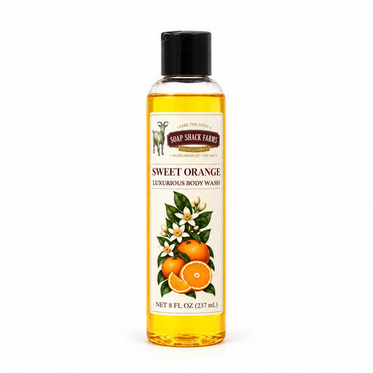Sweet Orange luxurious body wash in a slender clear 8 oz bottle with a black disc-top cap on a white background.
