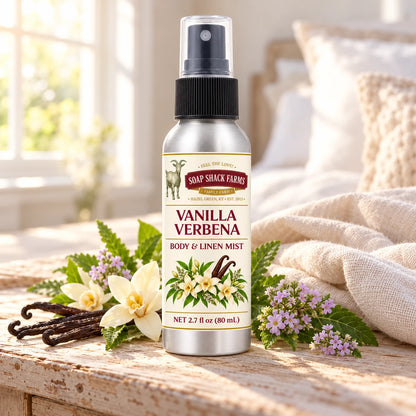 Soap Shack Farms Vanilla Verbena body and linen mist on a farmhouse bedside table with natural botanicals and linen.