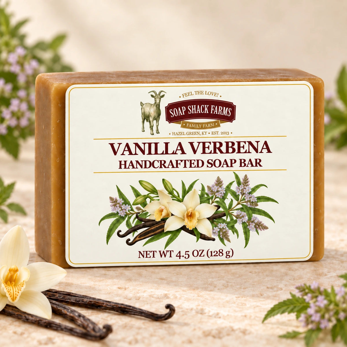 Vanilla Verbena olive oil soap bar on warm cream stone with vanilla beans and verbena flowers.